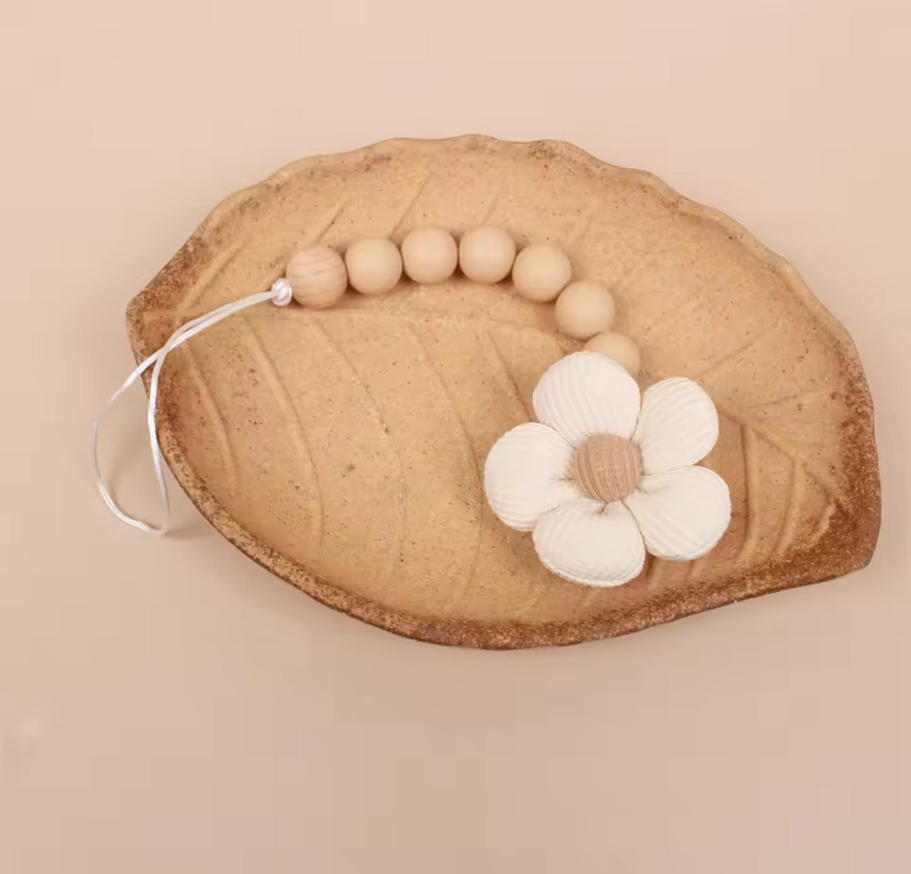 Attache tétine fleur - Accessoire élégant et pratique