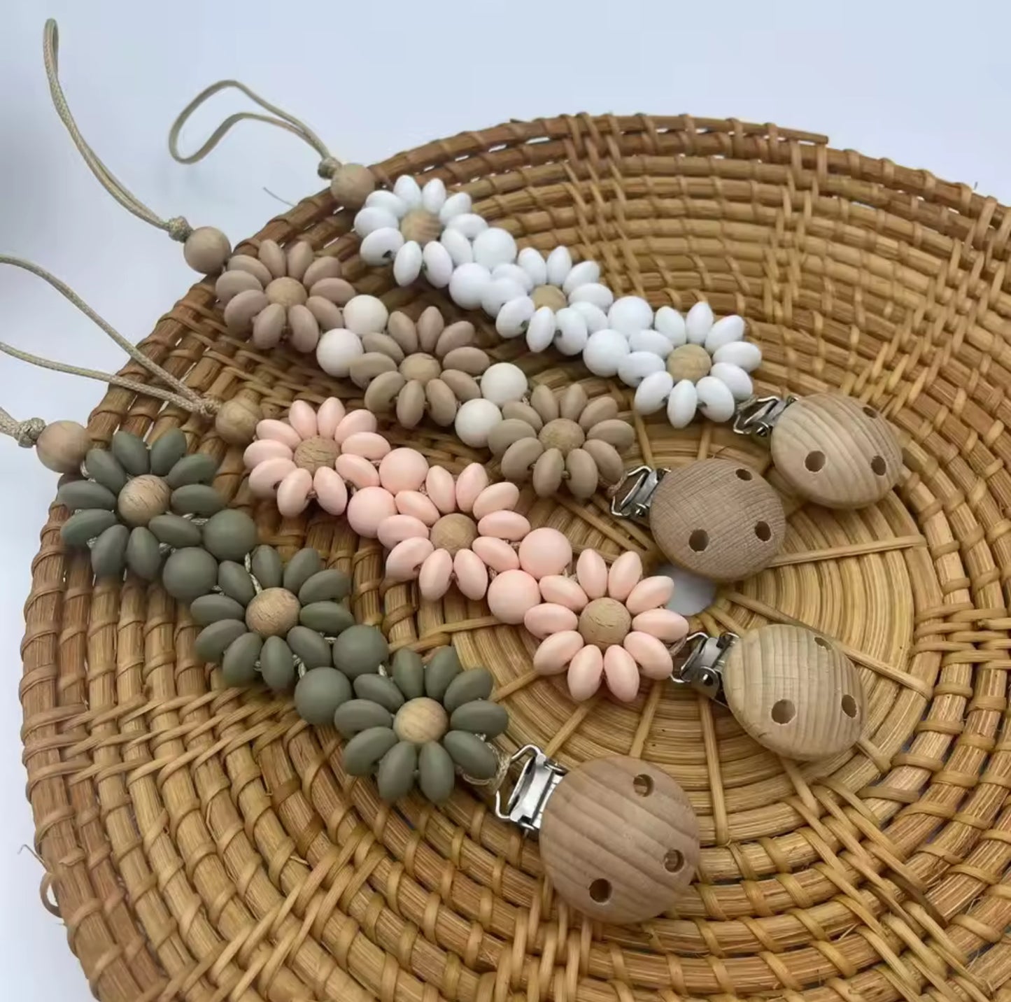 Attache tétine fleur