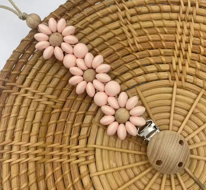 Attache tétine fleur
