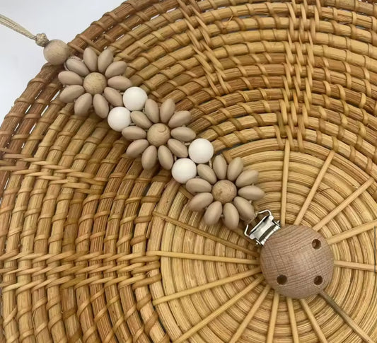 Attache tétine fleur