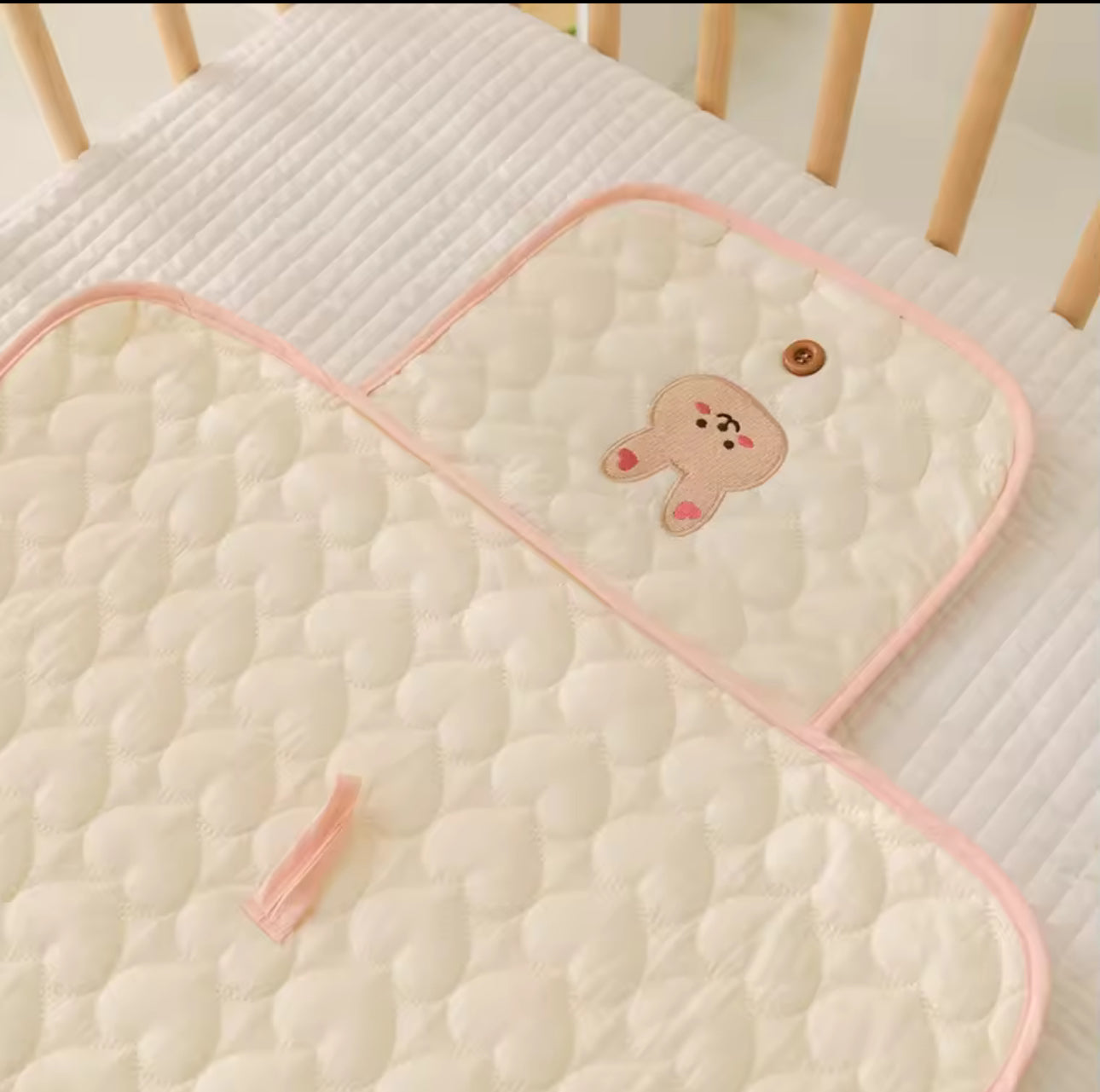 Matelas à langer pliable